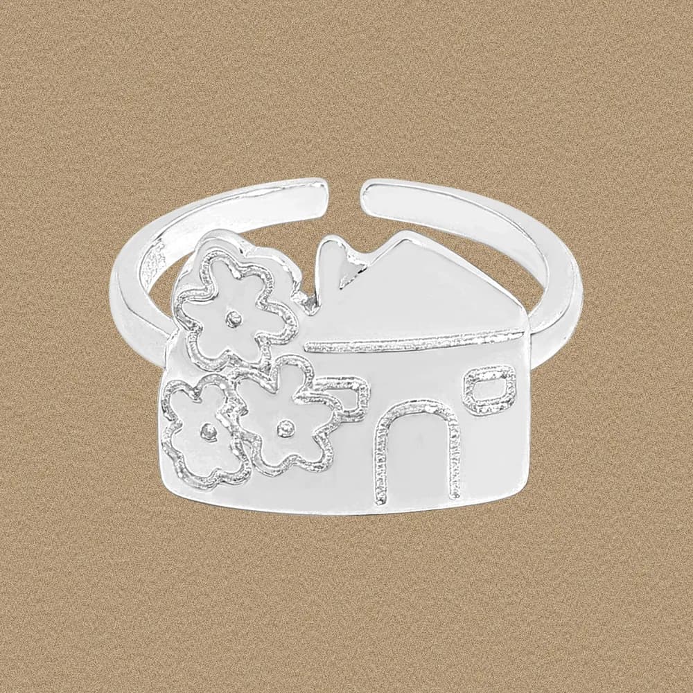 Open-band sterling silver ring showcasing a house silhouette with three outlined flowers attached to the left.
