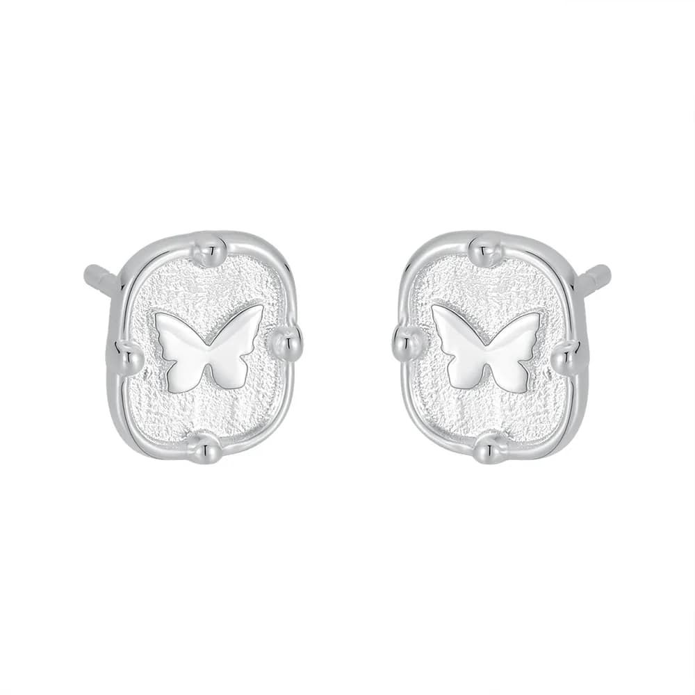 Butterfly Cutout Stud Earrings in Silver — Sterling silver