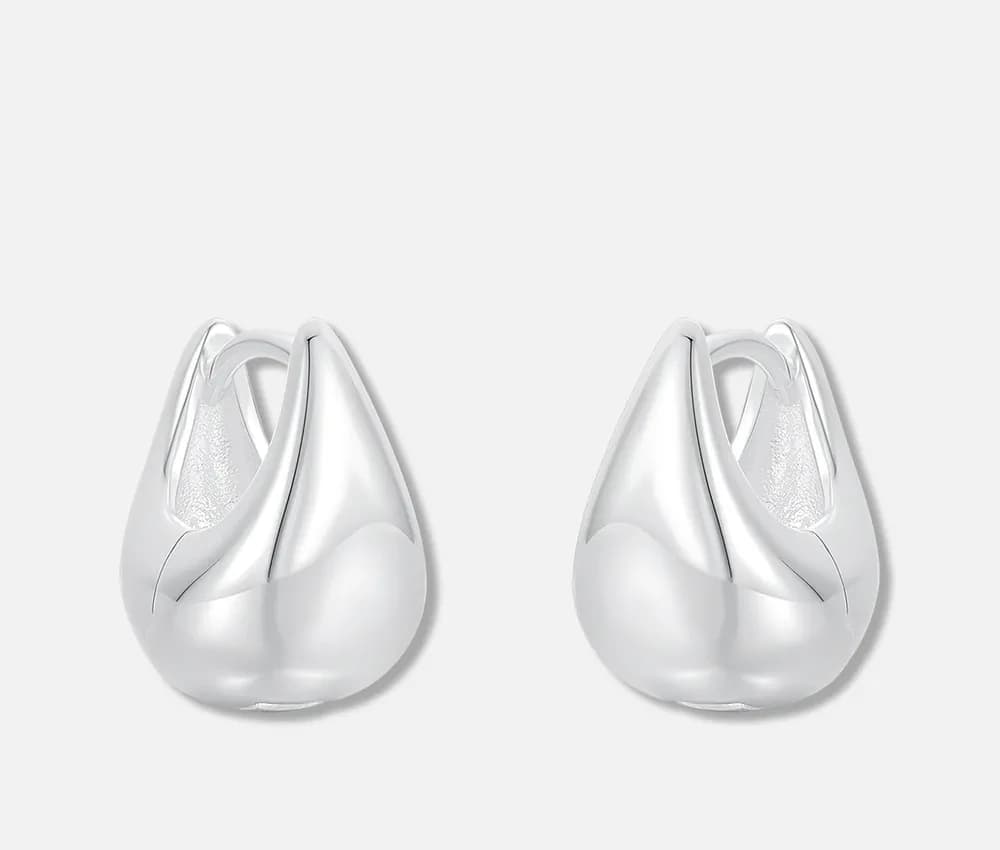 Polished sterling silver teardrop hoop earrings displayed front-on.
