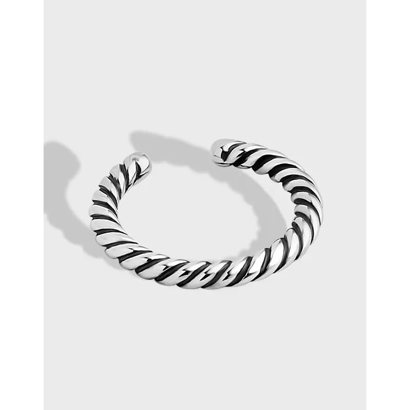 Sterling silver twisted rope ring in an open cuff style with polished finish