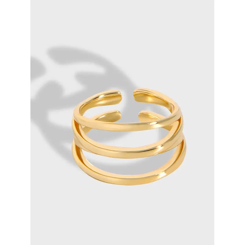 Polished sterling silver triple-band ring with open ends and smooth, rounded edges.