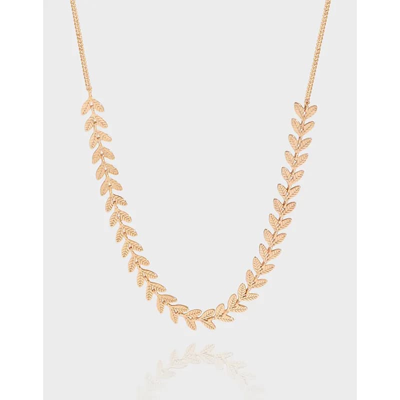 Polished sterling silver necklace with two curved leaf links forming a V at the center