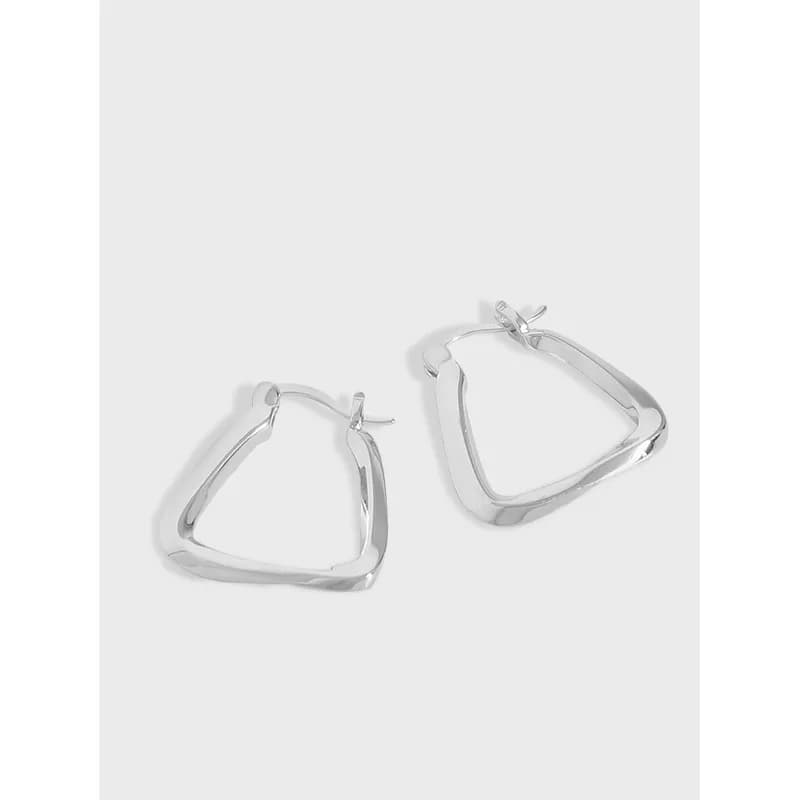 Polished sterling silver triangular hoop earrings with an open, irregular triangle shape and hinged posts.