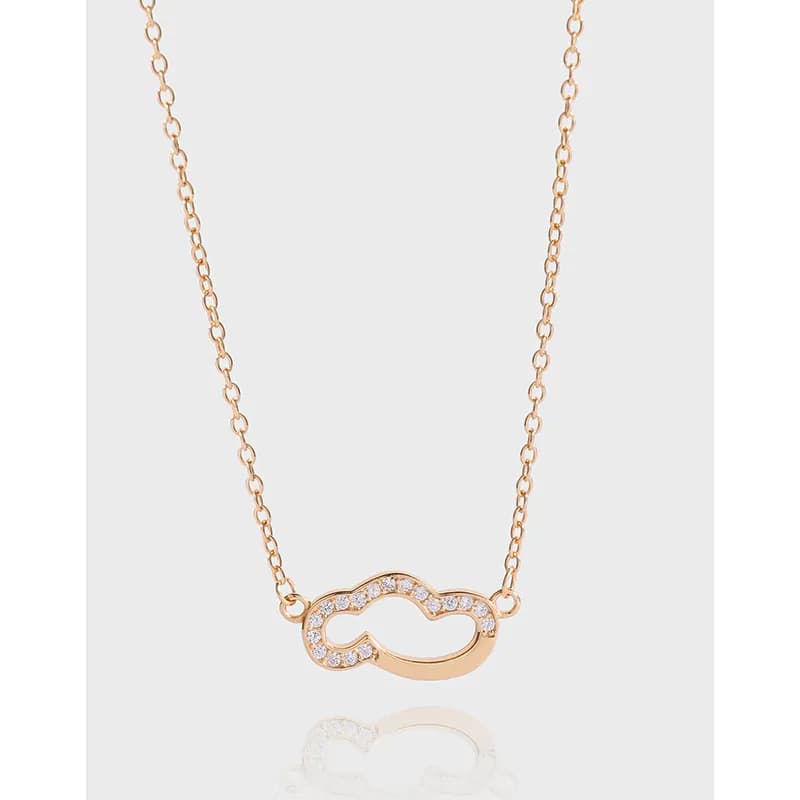 Polished sterling silver necklace with a cloud-shaped pavé pendant