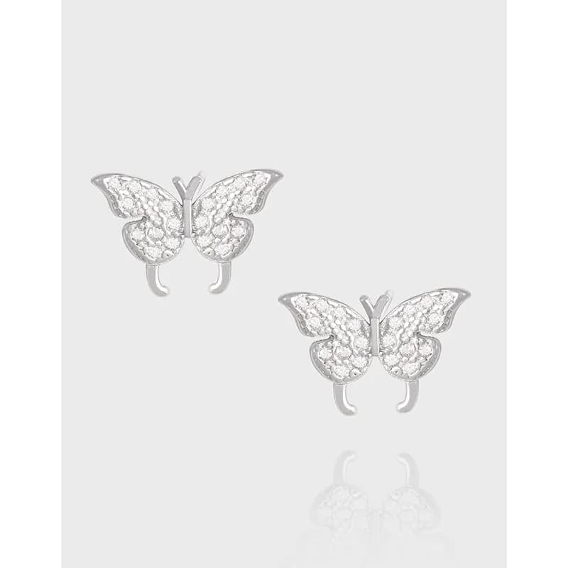 Pair of sterling silver butterfly pavé earrings with a polished finish