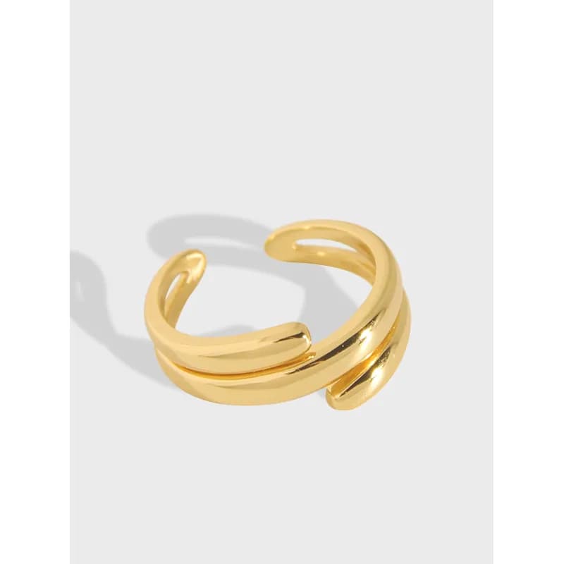Polished Sterling Silver ring with two curved bands in an open crossover design.