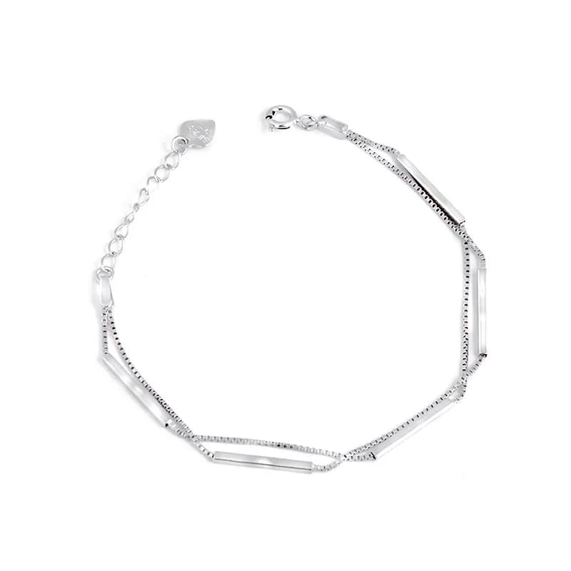 Polished sterling silver geometric tube bracelet with extender chain and small end charm