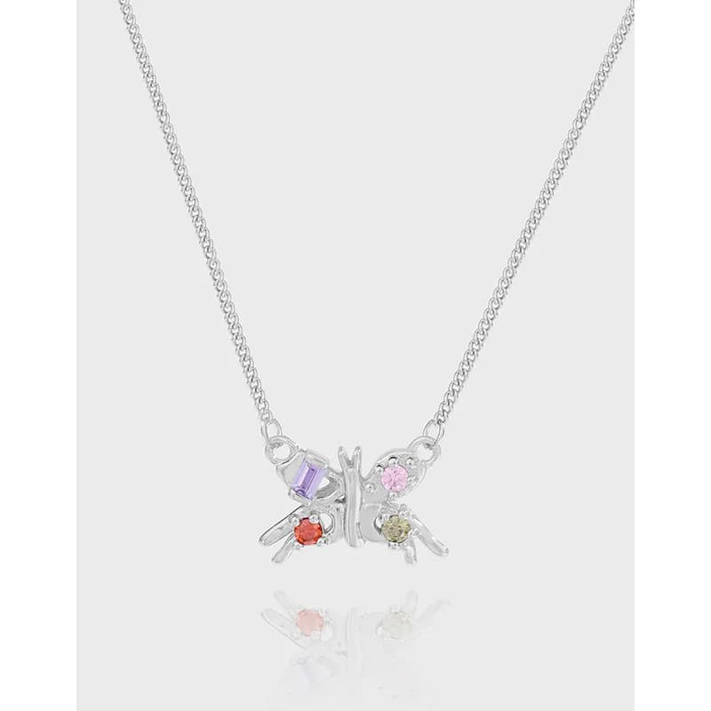 Sterling silver chain with a polished pendant featuring twin butterfly shapes and colorful gemstone accents.