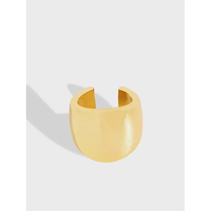 Polished sterling silver crescent-shaped open cuff earring shown against a light background.