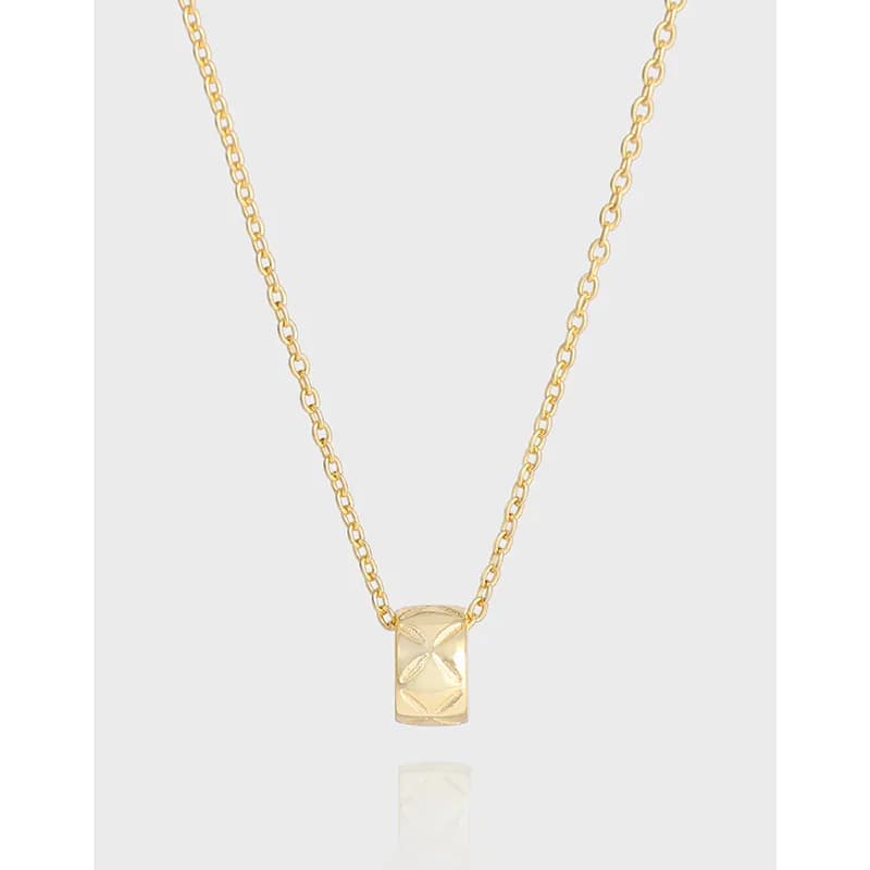 Polished gold-tone rectangular faceted pendant on a thin chain