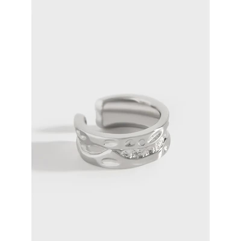 Polished silver Wavy Cutout Ring with openwork bands and pavé accent
