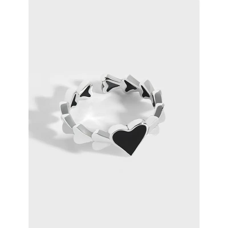 Sterling silver Heart Link Ring with alternating heart links and a black enamel heart centerpiece.