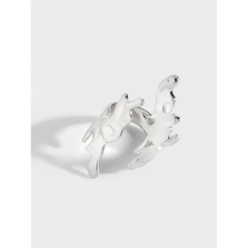 Polished sterling silver open-ring with coral-like irregular lobes and sculptural form.