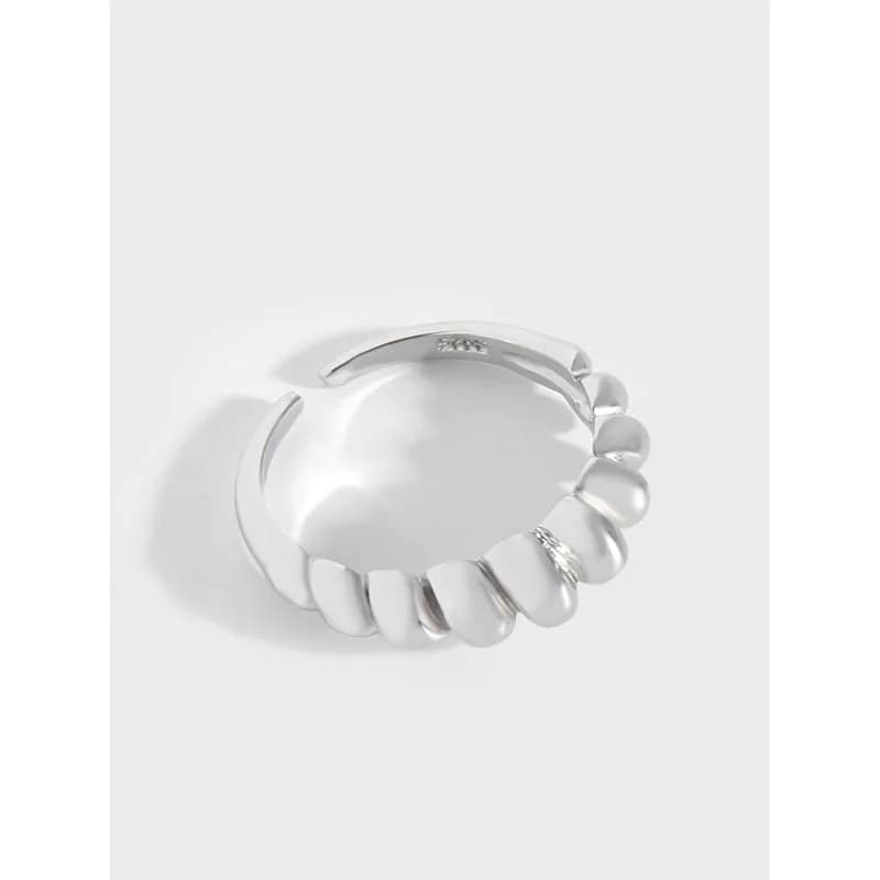 Polished sterling silver beaded arc ring with a curved open band and rounded bead detailing