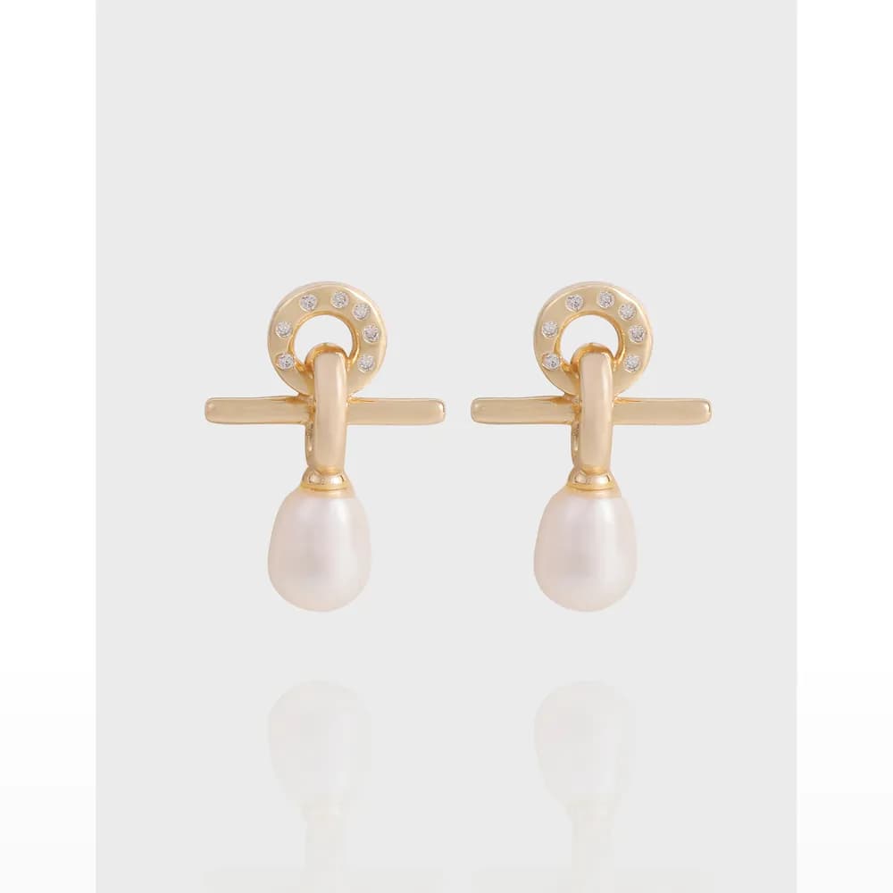Gold-tone stud earrings with a pavé circle and pearl drop featuring a horizontal bar