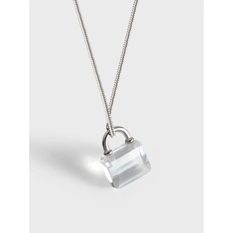 Polished sterling silver necklace with a rectangular crystal pendant on a thin chain.
