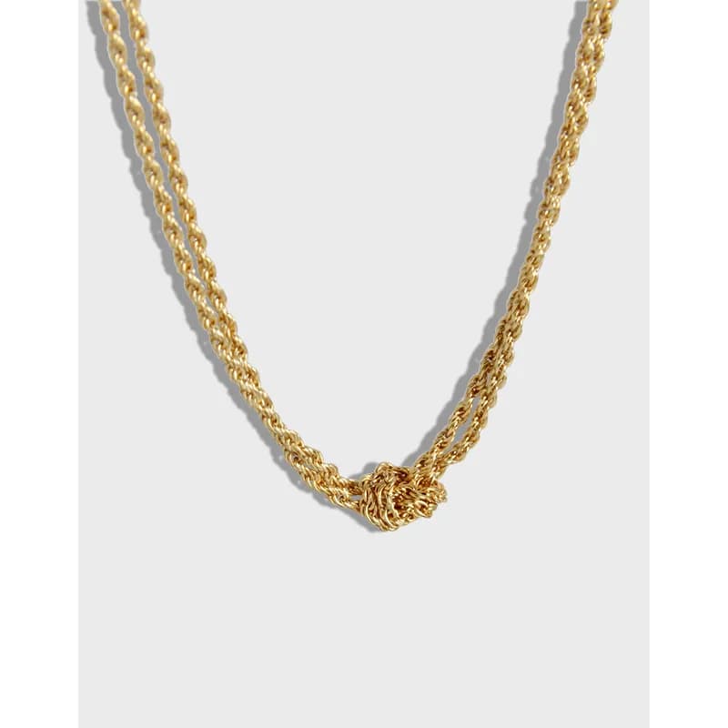 Polished sterling silver knot centerpiece on a double rope chain necklace