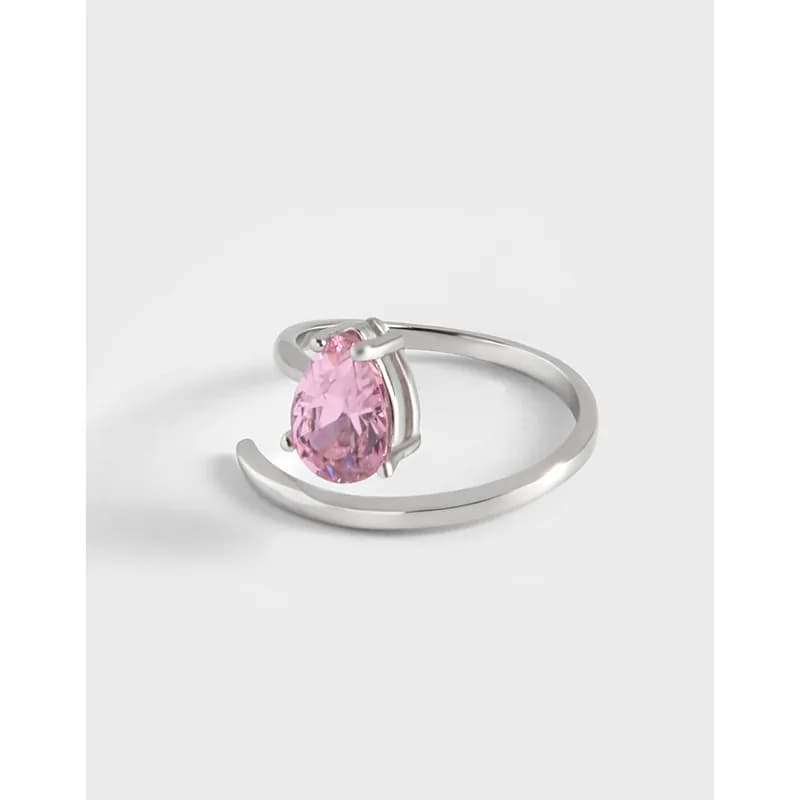 Sterling silver open curved band ring with a pink pear-cut gemstone centerpiece