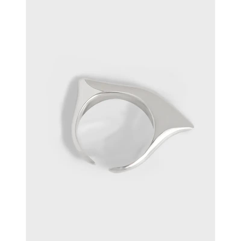 Polished sterling silver ring with an abstract curved wave design