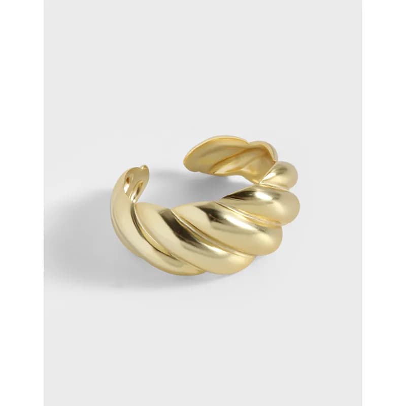 Polished sterling silver twisted rope ring with an open wrap design on a white background.