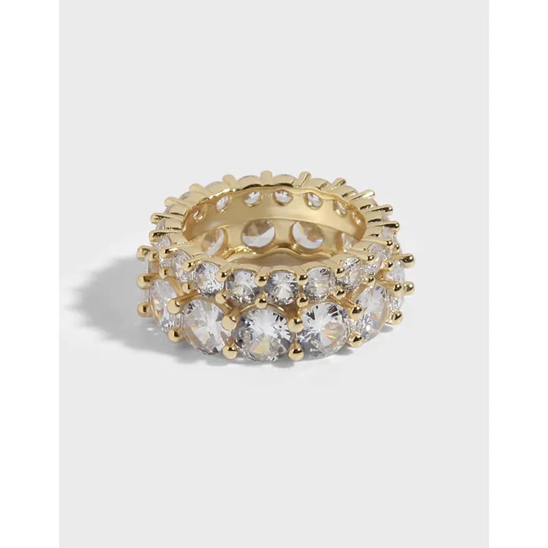 Polished two-row crystal stack ring in gold-tone plating on sterling silver band.