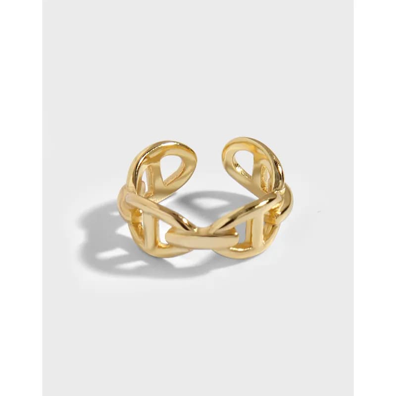 A polished sterling silver ear earrings with two interlocking loops forming an open cuff design.