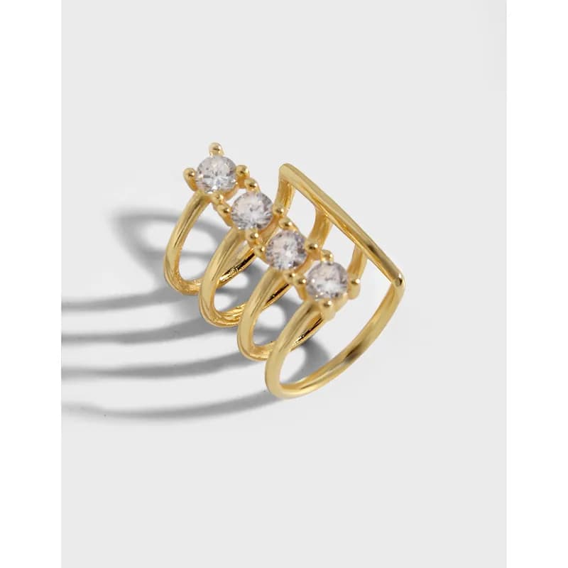 Polished sterling silver arc earrings with four round stones set along the top edge.