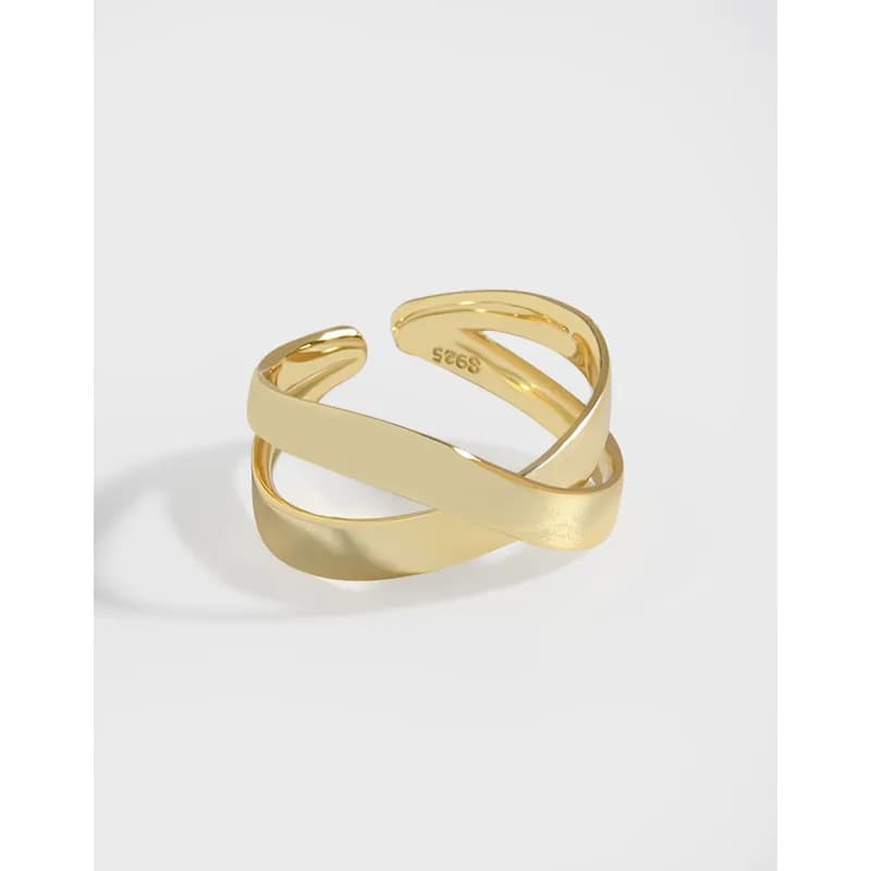 Gold-tone sterling silver ring with two interlocking curved bands crossing over each other.