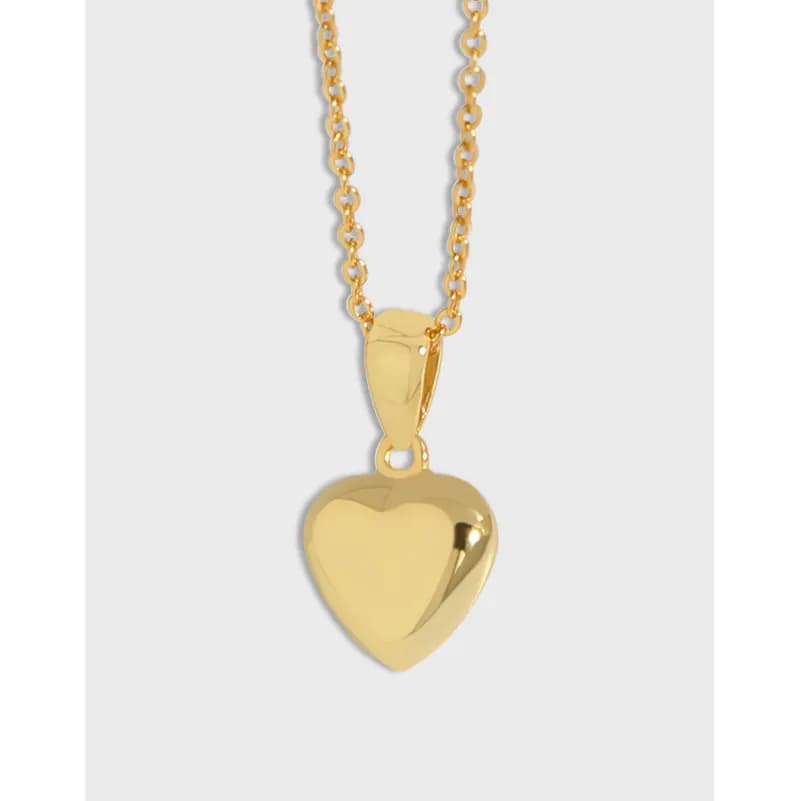 Polished heart pendant on a delicate chain necklace
