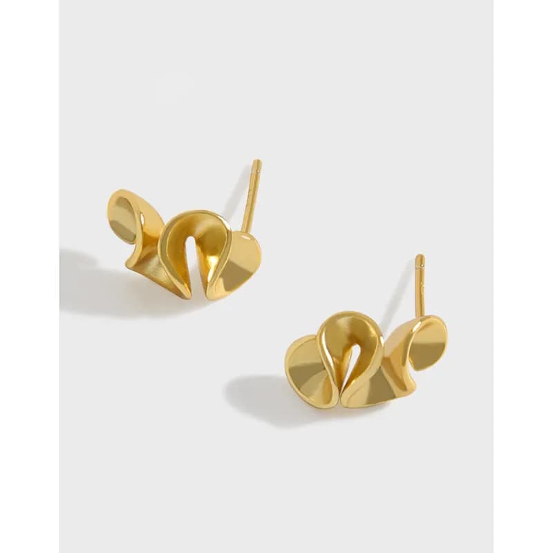 Polished sterling silver abstract heart-shaped earrings with posts and curved design.