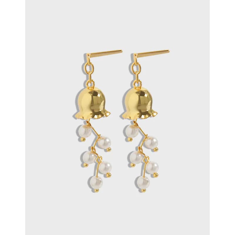 Polished sterling silver earrings with a bell charm and cascading pearl-like beads hanging from a slim post