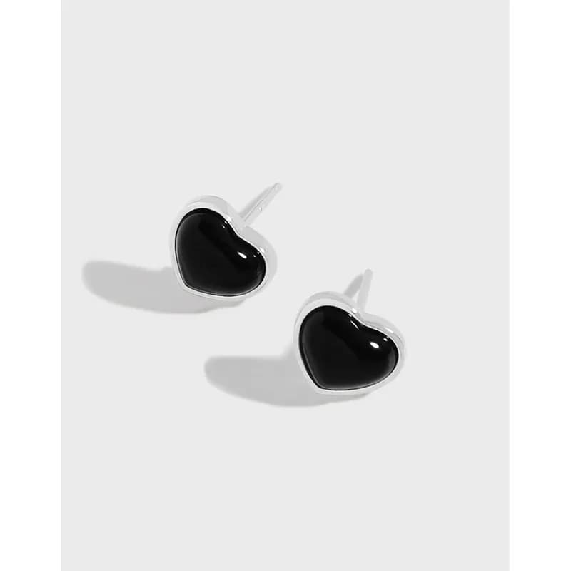 Pair of polished sterling silver heart-shaped black enamel stud earrings with posts
