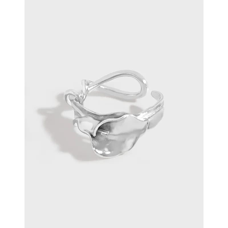 Polished sterling silver ring with an organic floral petal design