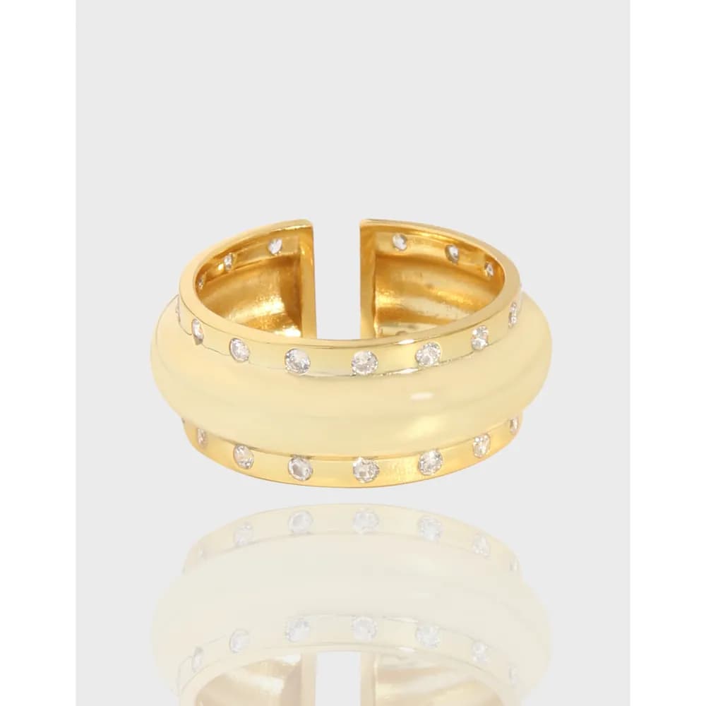 Open-ended gold-tone ring with two bands and small clear stones along the edges.