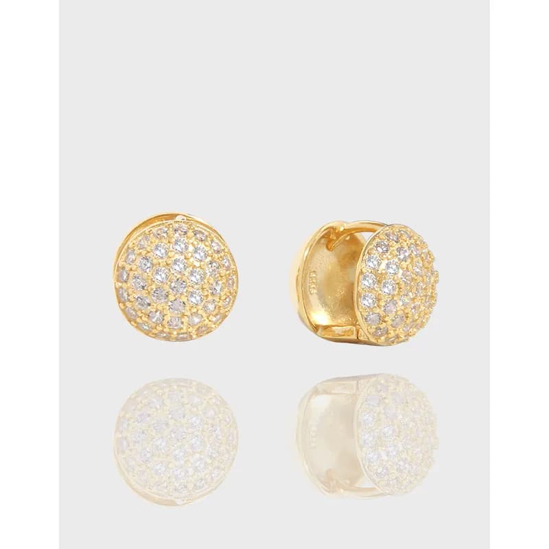 Round pavé-studded disc earrings with a polished metal finish