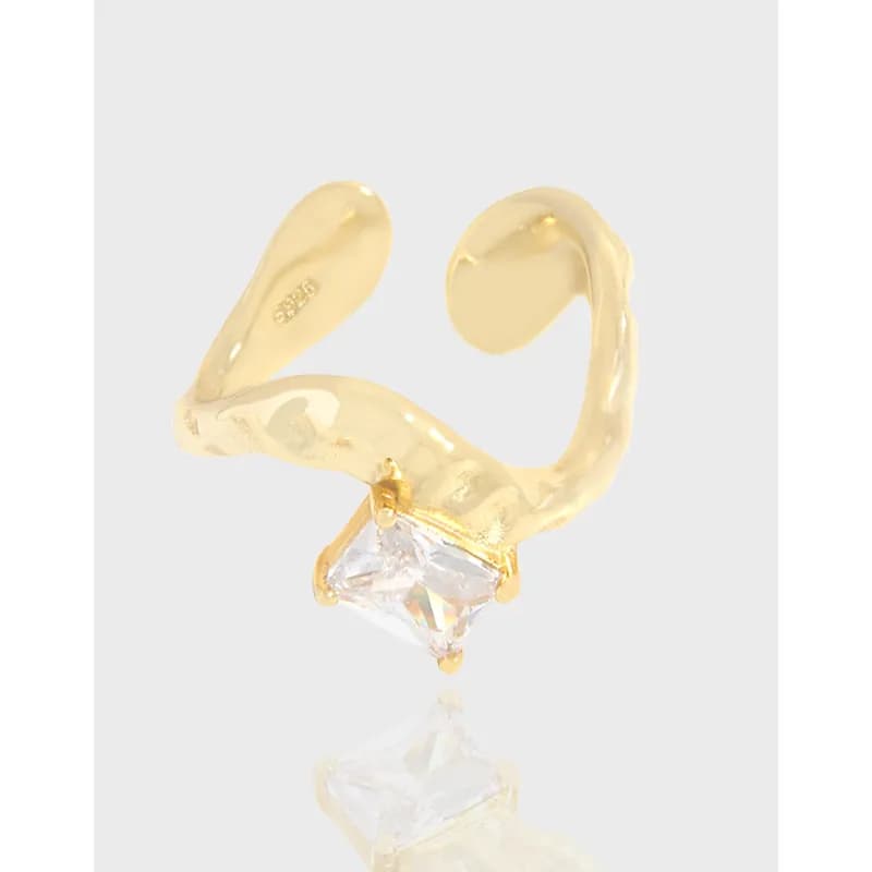 Polished sterling silver open curved ring with a square-cut gemstone set in prongs at the center of the band.