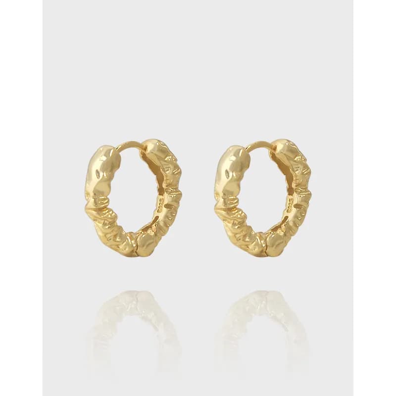 Pair of small textured hoop earrings in polished sterling silver