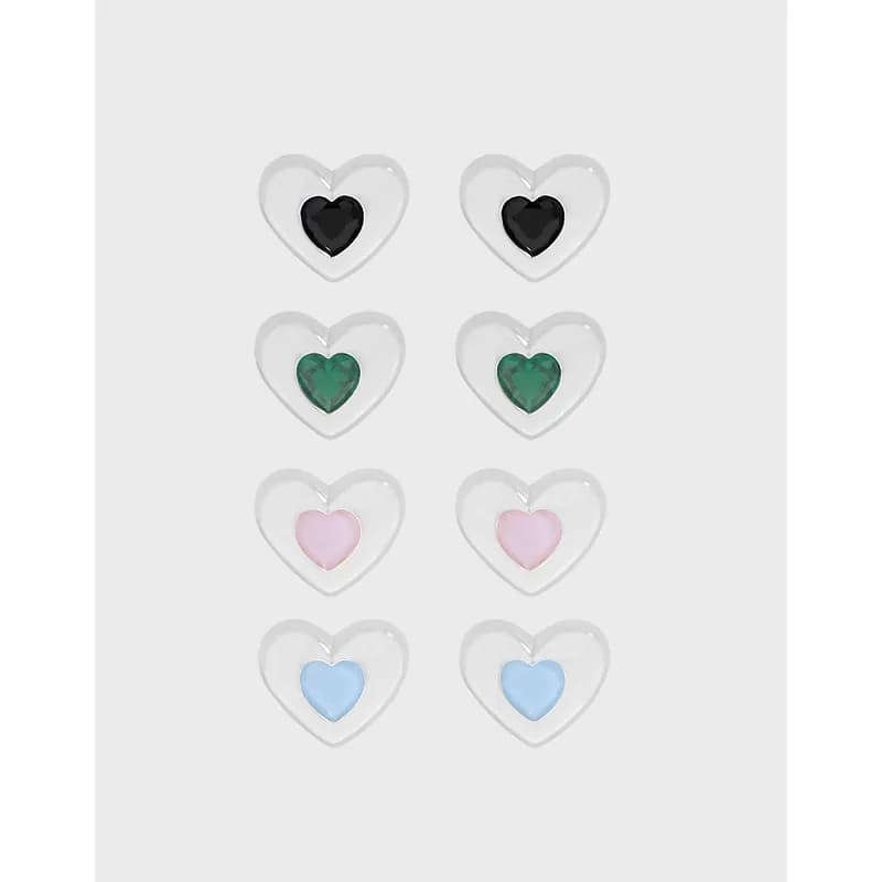 Polished sterling silver heart stud earrings with colored enamel centers arranged in rows.