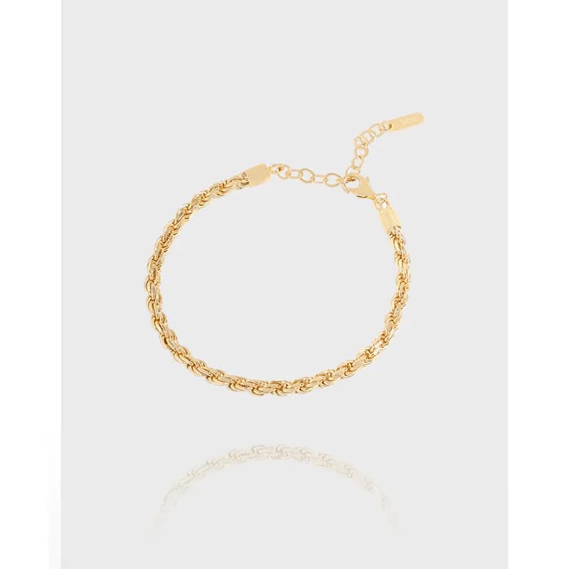A polished sterling silver rope chain bracelet with an adjustable clasp on a light background.