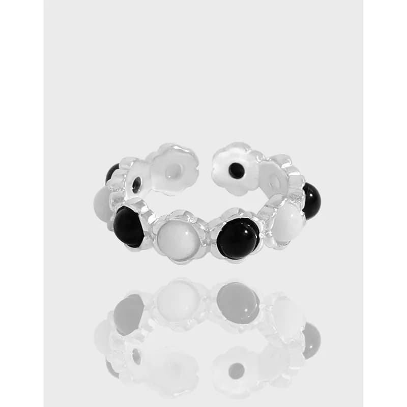 Polished sterling silver Beaded Circle Ring with alternating black and white beads on the band.