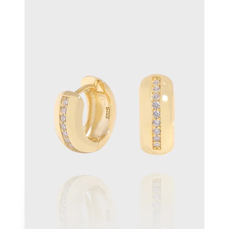 Polished sterling silver hoop earrings with a front pavé row of stones.