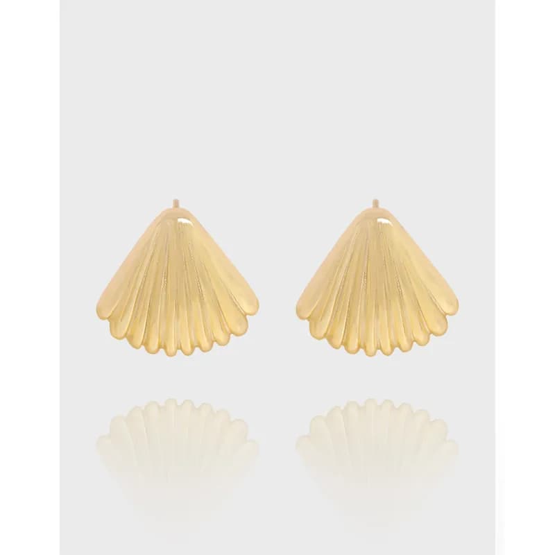 Polished scallop shell earrings in sterling silver displayed on a light background.
