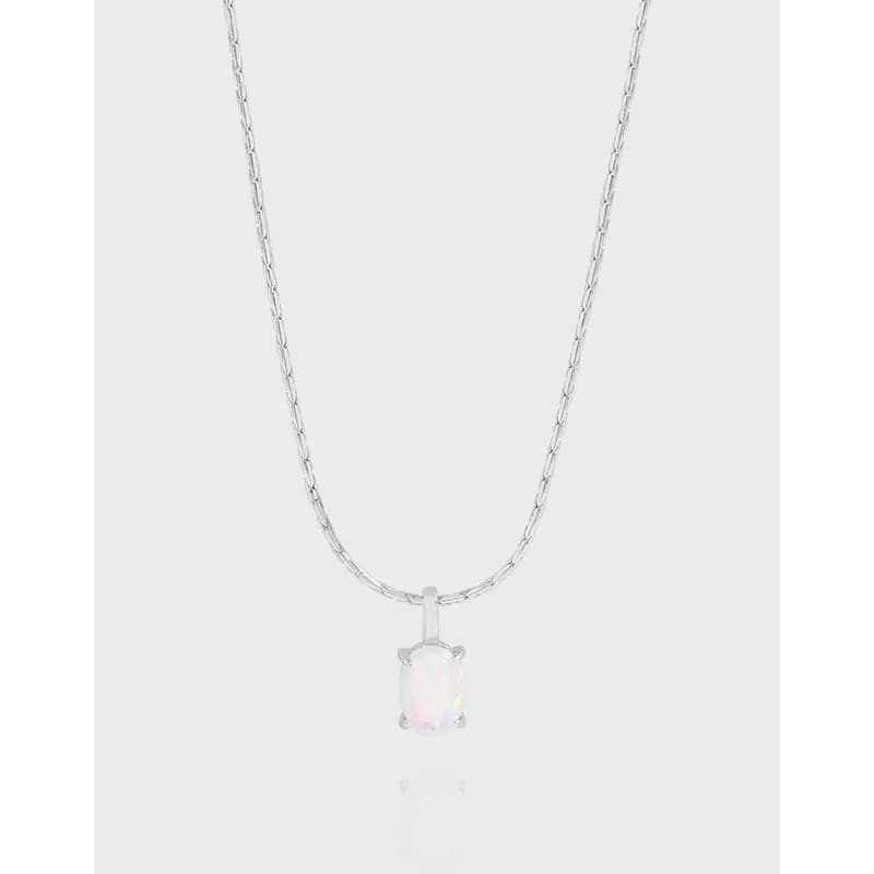 Sterling silver necklace with a cushion-cut iridescent pendant on a delicate chain.