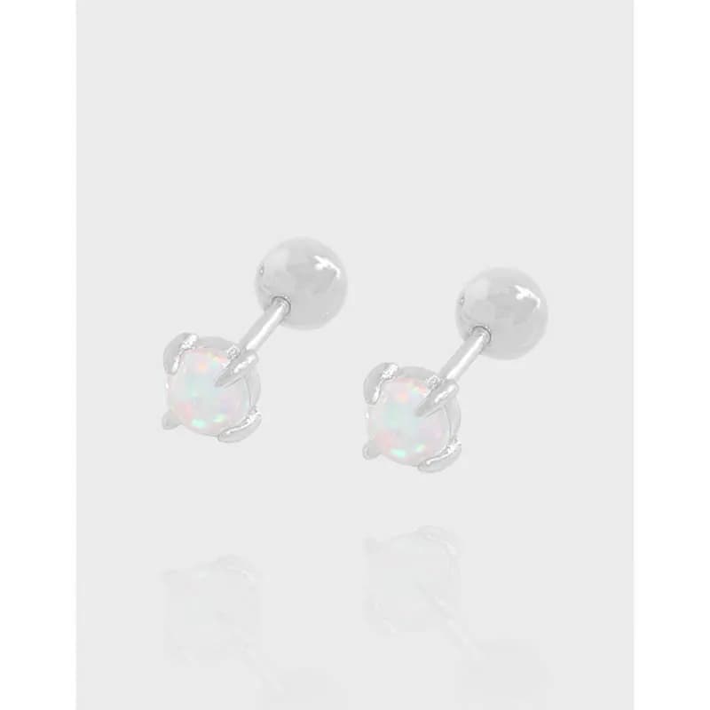 Pair of sterling silver opal stud earrings with prong-set stones on polished posts