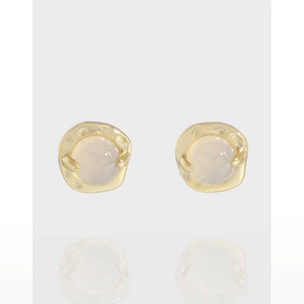 Polished sterling silver opalescent cabochon studs with a rounded-square setting