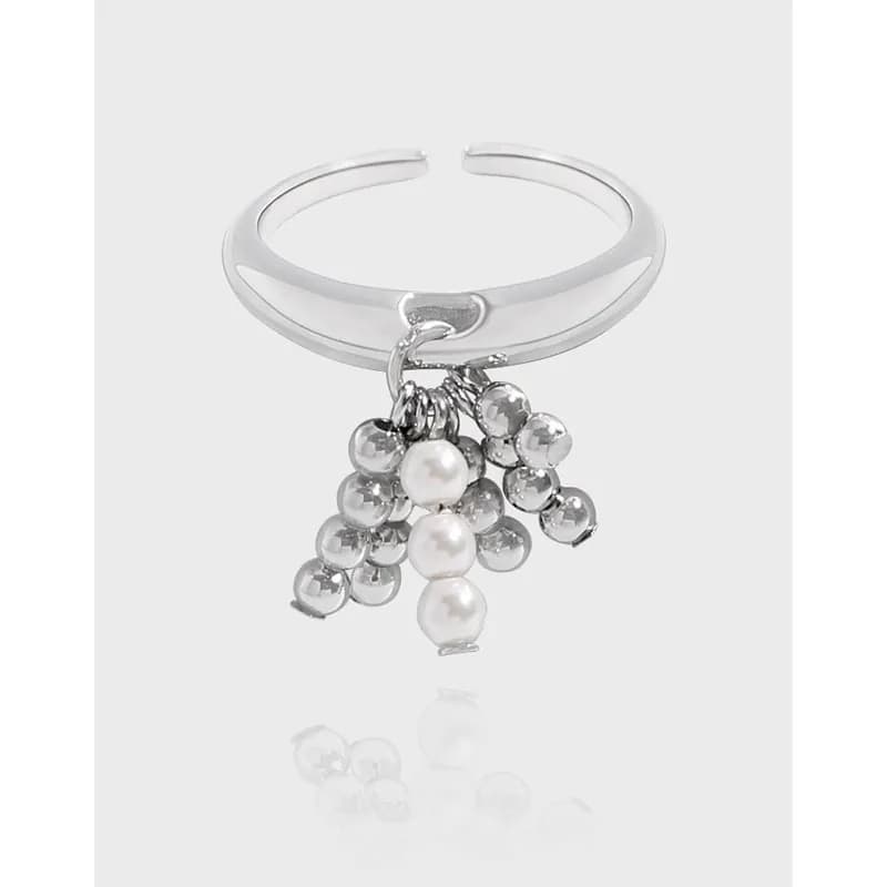 Polished sterling silver open-band ring with a cascading cluster of silver beads and pearls hanging from the front.