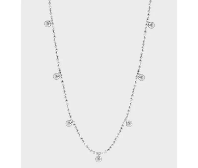 Polished sterling silver necklace with small disc charms along the chain and a central disc pendant.