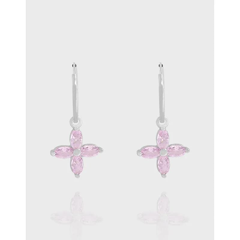 Pair of sterling silver drop earrings with pink four-petal flower charms