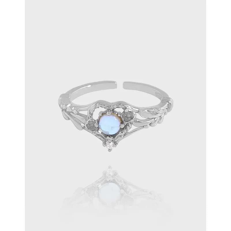 Polished sterling silver Moonstone Halo Ring with a floral halo setting