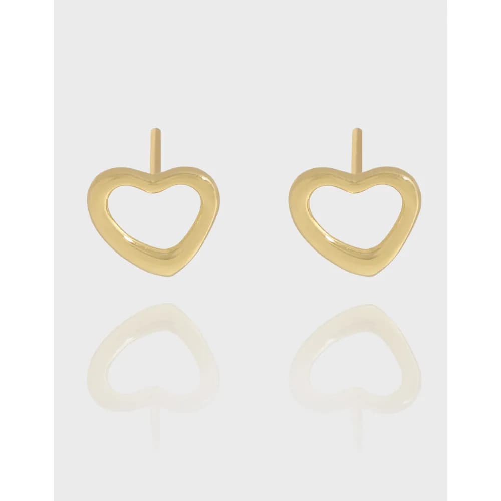 Two polished sterling silver heart-shaped stud earrings with posts.